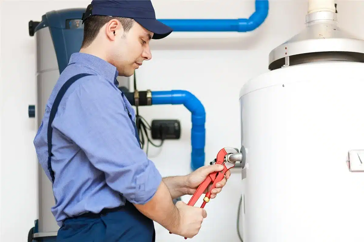 A Professional man Installation a boiler