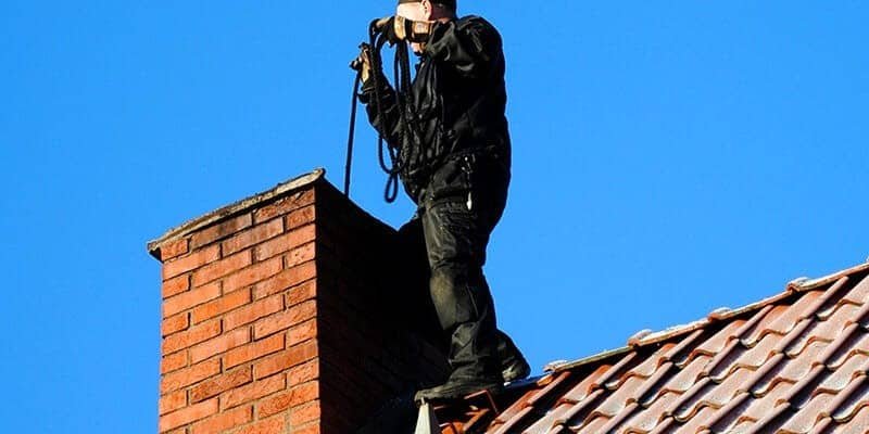 A man Clean Chimney