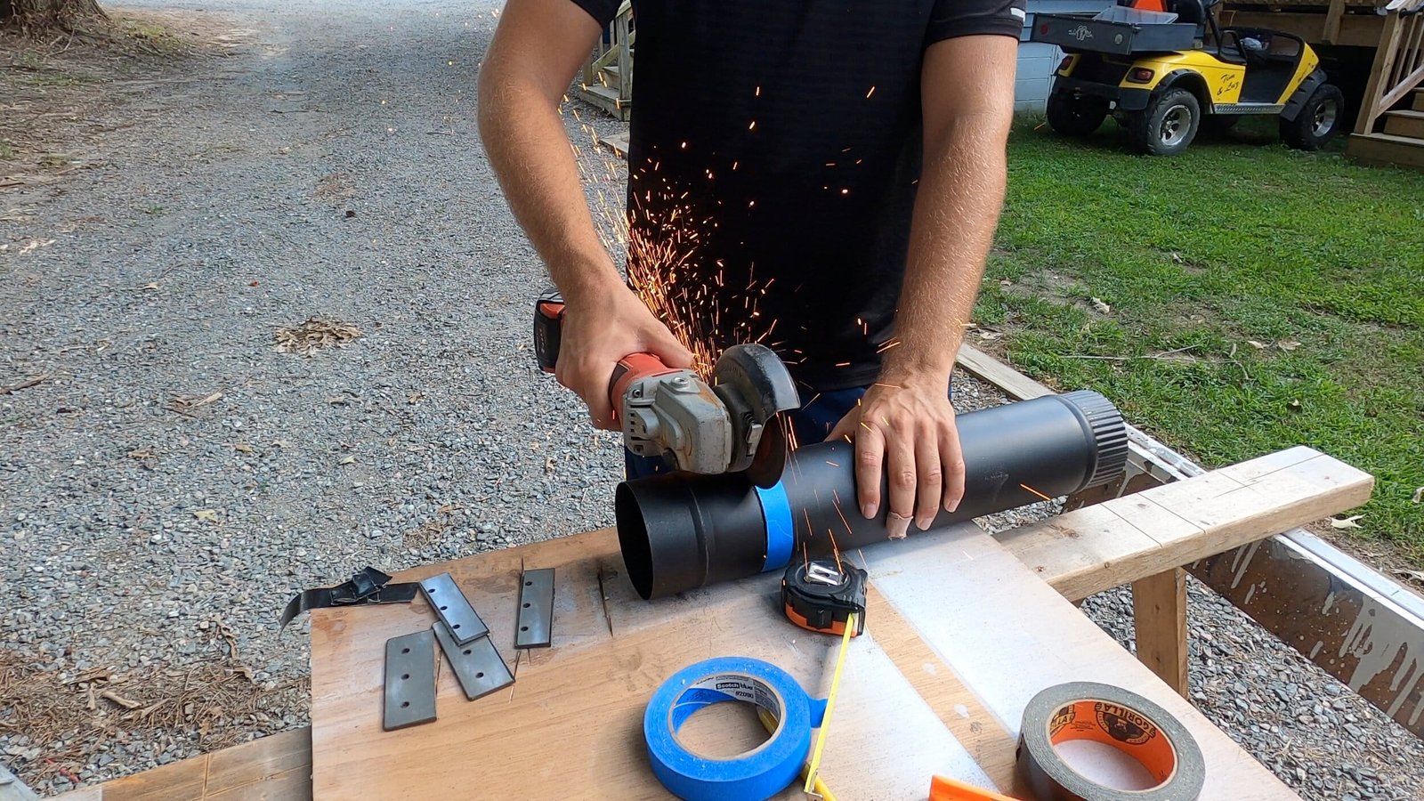 A man Cutting the Stove Pipe